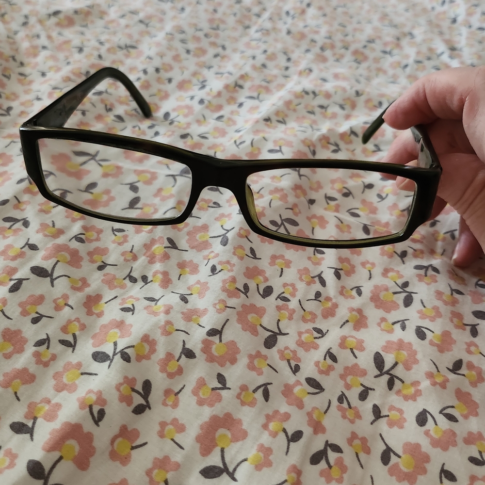 Prada Rectangular Eyeglasses with Sleek Design